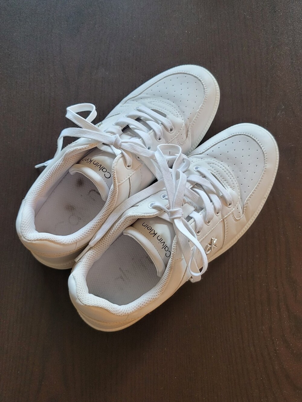 Striking Calvin Klein White Leather  Debossed (Indented) Black Logo On  Tongues
